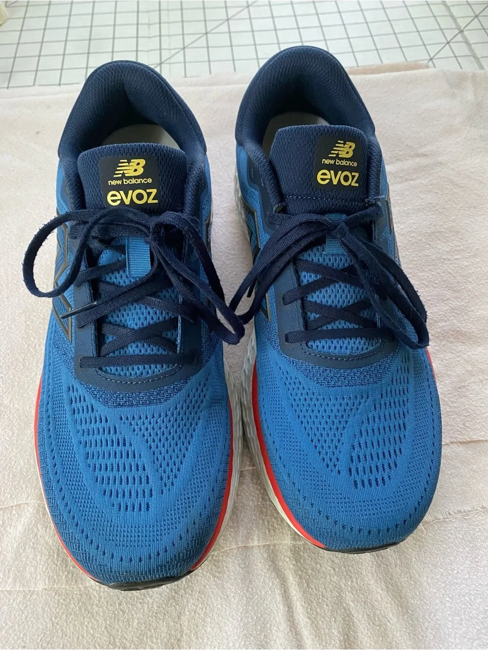 New Balance EvoZ Men's Blue and Navy Athletic Running Shoes with Red Accent